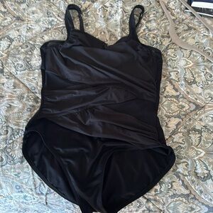Miracle suit 
Size XL
Color black